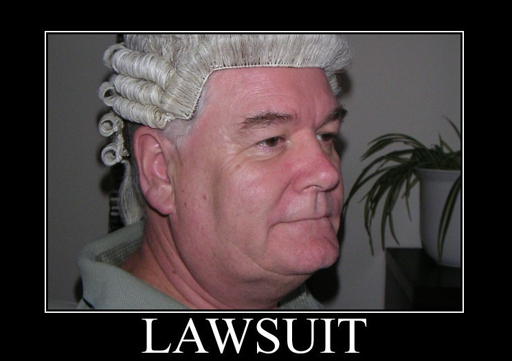 a rather sad image of a lawyer with the text 'lawsuit' beneath